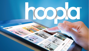 Person browsing the hoopla catalogue on a tablet.