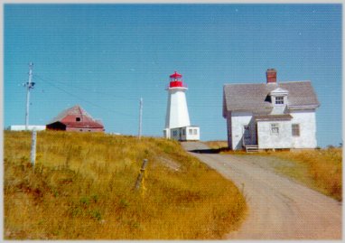 Lighthouse with keeper's house and barn