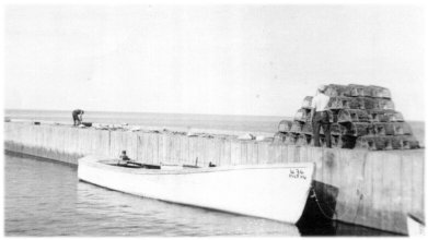 Empty boat moored at dock